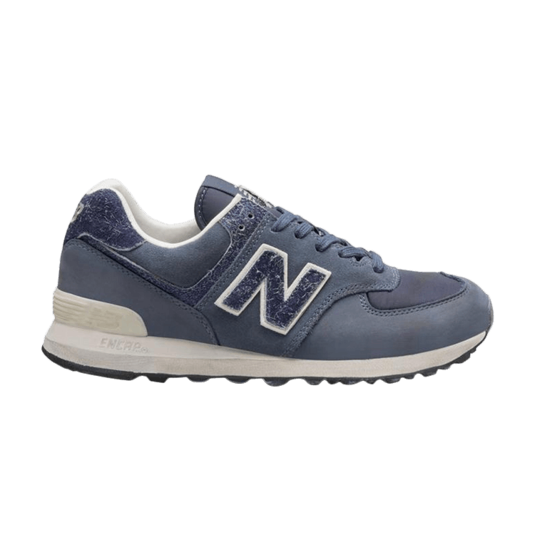 Invincible x New Balance 574 'The Old Is New' — Navy Blue